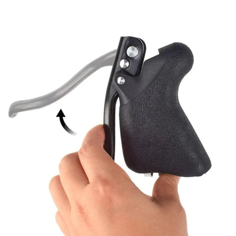 Hand using Aluminum Alloy Road Bike Brake Levers Set Replacement Handles For Road Cycling on a black textured handle