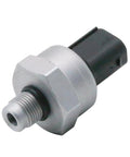 Brake fluid pressure sensor, silver metal body with hex nut, threaded end and black electrical connector.