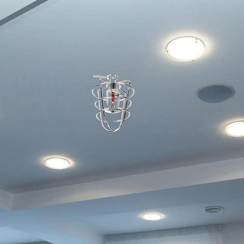 Rock Solid Heavy Duty Fire Sprinkler Head Guard Sturdy Iron Metal Shield Cover For Ceiling Pipe Setup Durable Cage Protector Built Tough As Nails For Commercial Facilities Knockout Protection mounted above a ceiling.