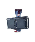 Person carrying Slim Fold Cook Station Portable Folding Kitchen Table with Heat Resistant Top and Storage Rack