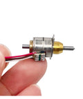 Dope Pro Grade 10mm Precision Stepper Motor Starter Kit For DC 5V And 6V Systems shown held in fingers, close-up view