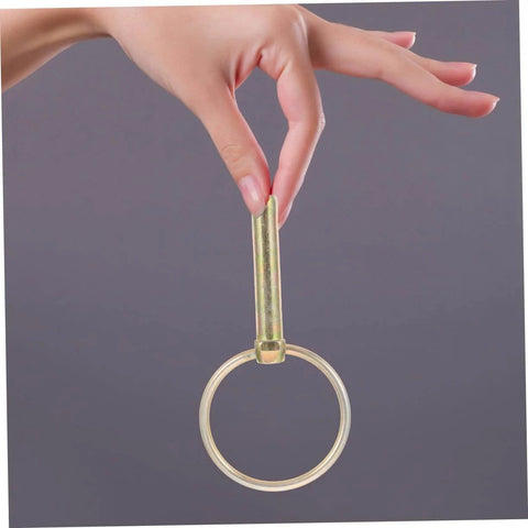 Hand holding a pin from 12 Piece Beefed Up Tractor Trailer Hitch Pins Kit With Heavy Duty Retaining Pins And Rings for secure towing.