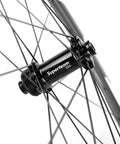 Close-up of hub on High-Performance 50mm Carbon Fiber Disc Brake Wheelset For Road Bikes, 700c Clincher With UD Matte Finish