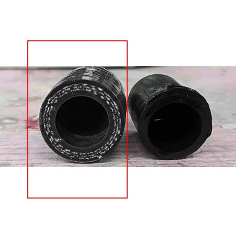 Universal Three-Eighths Inch High Temperature 3-Ply Silicone Hose Cap End Plug, black, shown from side view on surface