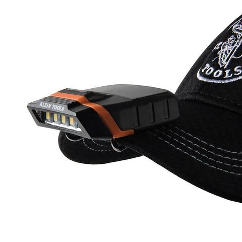 Cap Visor Clip LED Light With Pivoting Head, Battery-Powered 2xAAA mounted on black cap; side view with light detail.