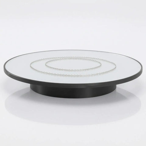Stupendous Electric Rotating Display Stand With 360 Degree Turntable Rotation For Professional Jewelry Photography And Small Item Filming Featuring A Rock Stable Round Base to showcase a silver chain.