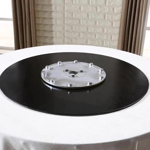 Smooth As Butter Black Tempered Glass Lazy Susan Turntable Built Different 24 inch rotating serving tray on table.