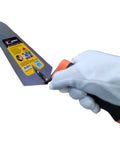 Gloved hand holding 2-Piece Pointing And Gauging Trowel Set, 6 Inch Masonry Hand Tools With Soft Grip Handles, carbon steel blade.