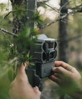 Hella Rugged Cellular LTE Trail Camera With Kick Ass Night Vision And Waterproof Build designed for wildlife tracking mounted on a tree.