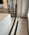 Flexible Race Car Track Set With Pressure Suction Cups, Two Lane Slot Track extended on kitchen floor