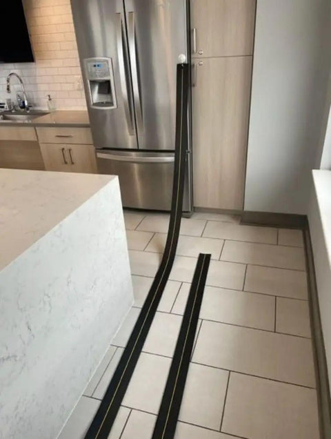 Flexible Race Car Track Set With Pressure Suction Cups, Two Lane Slot Track extended on kitchen floor