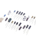 25 Pcs GameGear Capacitor Set For GG Motherboard Replacement, Standard Size Metal Capacitors For Stable Console Repair And Reliable Performance In Industrial Equipment Supplies. Assorted leaded capacitors on white background