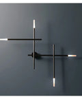 Modern Led Wall Sconce Crafted From Rust Resistant Metal With Soft Warm White Glow Designed For Any Room To Deliver Glare Free Illumination That Hits Different While Building A Super Chill Vibe on a dark wall.