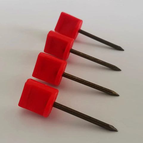 Four 20Pack Archery Target Pins Heavy Duty Manganese Steel Nails With Plastic Heads, showing red heads and metal shanks on a white surface.
