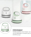 Fuss Free Rechargeable Desktop Vacuum Cleaner That Knocks Dust And Pet Hair To The Curb In Seconds in pink, green, and white, compact and portable.