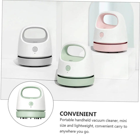 Fuss Free Rechargeable Desktop Vacuum Cleaner That Knocks Dust And Pet Hair To The Curb In Seconds in pink, green, and white, compact and portable.