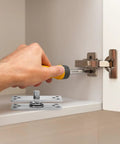 Installing Stainless Steel Concealed Pivot Hinge Delivering Smooth As Butter 360 Rotation For Cabinets with a screwdriver.