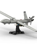 MQ-9 Reaper UAV Building Blocks Model Kit With 722 Pieces, side view on stand, realistic military aircraft display for adults