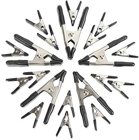 Amazon Basics 20-piece steel spring clamp set with black PVC-coated tips, arranged in a circle.