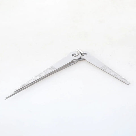 Pro Grade Welding Space Measuring Tool Set with steel feeler gauges, showcasing tapered design and graduated sizes for precise insertion.