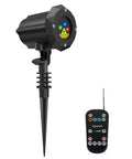 Garden Laser Christmas Lights Projector With Moving Firefly Stars, Red Green Blue Color Combo, shown with remote control