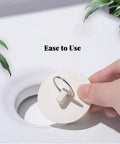 Four Piece Bath Tub And Sink Drain Stoppers Set with flexible rubber plug and hanging ring shown for easy use.