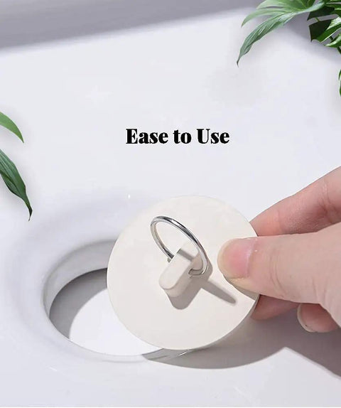 Four Piece Bath Tub And Sink Drain Stoppers Set with flexible rubber plug and hanging ring shown for easy use.