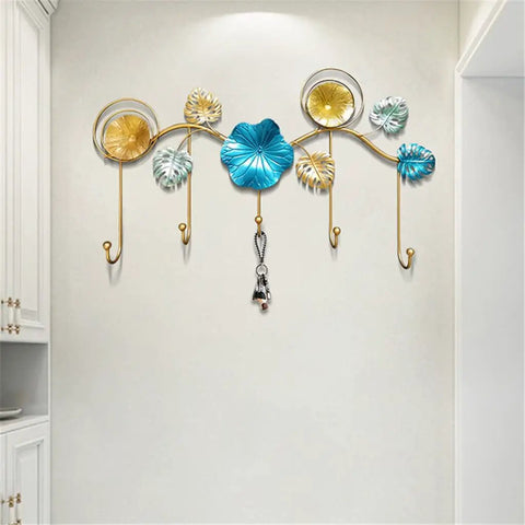 Rock Tight Wrought Iron Wall Hook For Sleek Nordic Style And Snug Door Storage That Locks In Keys Bags And Jackets Without A Sweat While Serving Heavy Duty Swag On Your Front Porch, decorative wall hook with floral design.