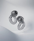 Engage 2 Ear Plugs For Everyday Noise Relief With Clear Speech At Social Gatherings, work calls, and noise sensitivity, shown floating