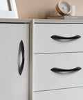 3 Inch Arch Twisted Matte Black Cabinet Pulls 10 Pack Heavy Duty Zinc Alloy Handles installed on white furniture