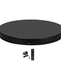 Heavy Duty 24 Inch Motorized Electric Turntable Stand With Remote Control featuring a smooth black surface and power adapter.