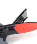 Close-up of All in One Drywall Tool With Built In Tape Measure And Utility Knife feature, showing orange handle and blade compartment.