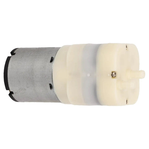 Rock Solid Mini Micro Air Vacuum Pump Running Next Level Quiet With Low Voltage Safety Design Knockout High Performance And Compact Durability, close-up of motor.