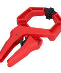 Heavy Duty One Hand Spring Clamp For Woodworking And Carpentry Shop Projects Quick Release with ABS plastic body and jaw grip.