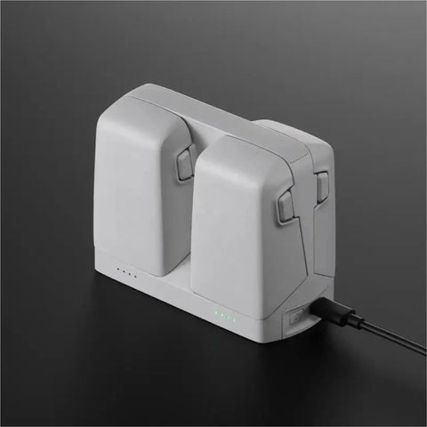 Drone Multi Battery Charging Station With LED Indicators for DJI Flip Parallel Hub, dual battery slots, black surface.