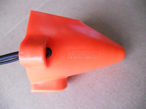 Close-up of an orange Sport Master Flusher Pro For Marine Engines, Durable Flush System F002 Replacement Part on cardboard surface.