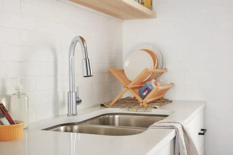 High Arc Pull Down Kitchen Faucet With 3 Function Sprayer And POWERinse Technology in modern kitchen, chrome finish
