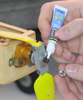 Person applying VC-3 Threadmate Red Threadlocker And Tape Kit For Fasteners to a bolt on machinery, 5mL tube visible.