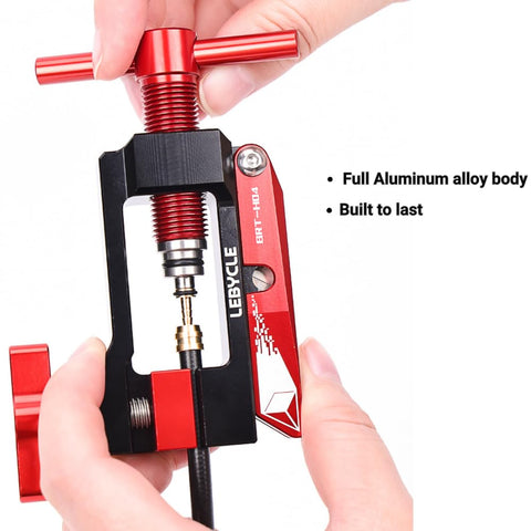 Hydraulic Disc Brake Hose Cutter And Needle Barb Driver Tool For Bikes shown in hand, red aluminum alloy tool, full view