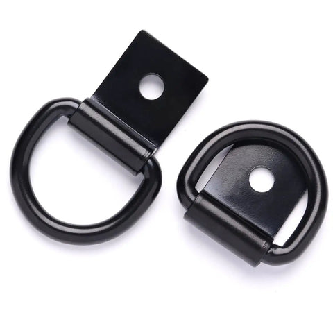 Rock Solid D Ring Tie Down Anchors Quarter Inch Heavy Duty Steel Load Holders Surface Mount Kit With Screws For Pickup Trucks Trailers Vans And Campers Weather Ready Black six piece set showing two black steel D ring anchors.