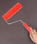 2 Pack Patterned Texture Paint Rollers With Cushioned Grips Crafted From Heavy Duty Rubber Ideal For Spreading Drywall Compound And Creating Custom Wall Patterns Gonna Make Your Decorating Tasks A Total No Sweat Deal, showing a close-up of a rubber texture roller.