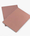 Two FR4 copper clad PCB boards, part of Eight Piece FR4 Copper Clad PCB Boards Set, 50mm X 70mm X 1.5mm, Single Sided for DIY Electronics Projects.