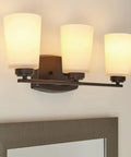 Three Light Wall Bath Fixture In Burnt Sienna Bronze Finish, Franport Collection; sleek wall sconce with warm lighting.