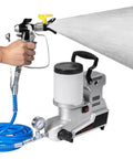 Badass Portable Airless Paint Sprayer With Hella Smooth 1600 Watt Motor And Adjustable Speeds For Fast Wall And Fence Jobs Featuring A Long Five Meter Hose And Low Noise Design That Keeps Spaces Super Clean in use, spraying paint