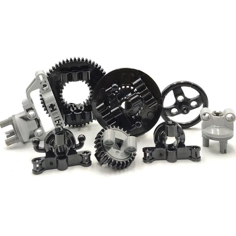Close-up of gears and parts from Technical Car Suspension Building Kit With 144 Pieces Including Wheels Connectors Shock Absorbers Turntable.