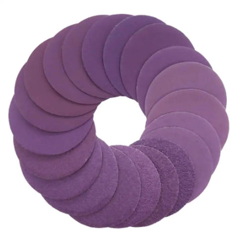 Get Ready For Some Serious Sanding With These 100 Piece 5 Inch Grit 80 To 600 Wet Dry Sanding Discs circular arrangement of assorted grit sanding discs.