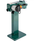 Hardbody 4X48 Inch Dual Wheel Metal Belt Grinder And Shop Sander Rigged To Crush Steel Tasks And Dial In Perfect Angles For Garage Crews In Glossy Black on a sturdy green metal base.