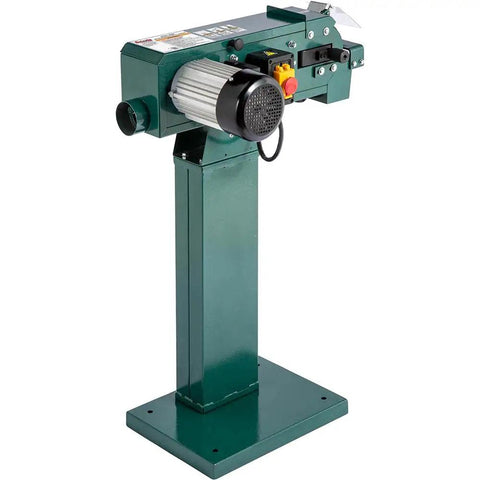Hardbody 4X48 Inch Dual Wheel Metal Belt Grinder And Shop Sander Rigged To Crush Steel Tasks And Dial In Perfect Angles For Garage Crews In Glossy Black on a sturdy green metal base.