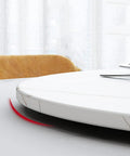 Close-up of the Marble Lazy Susan 360-Degree Rotating Serving Plate on a table, showing the 23-inch white marble finish and non-skid edge.
