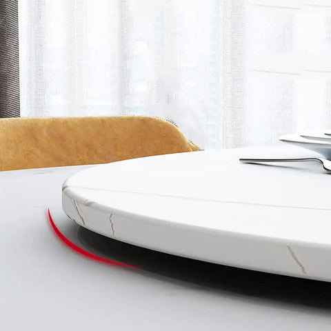 Close-up of the Marble Lazy Susan 360-Degree Rotating Serving Plate on a table, showing the 23-inch white marble finish and non-skid edge.